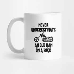 Never underestimate an old man on a bike Mug